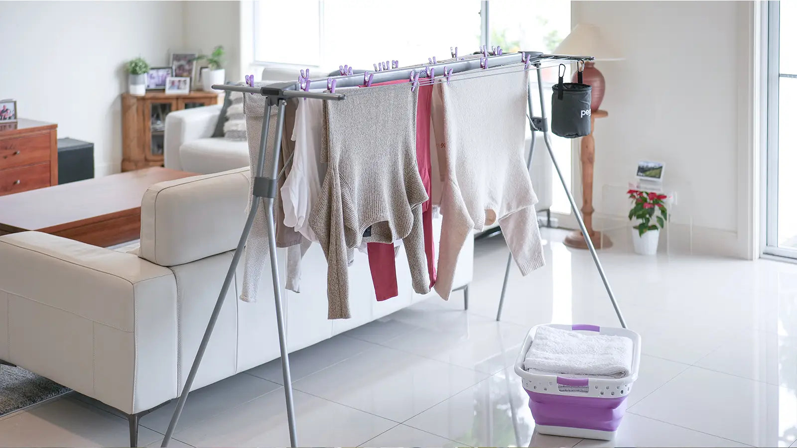 A Deluxe Handy Line with clothes hanging on it