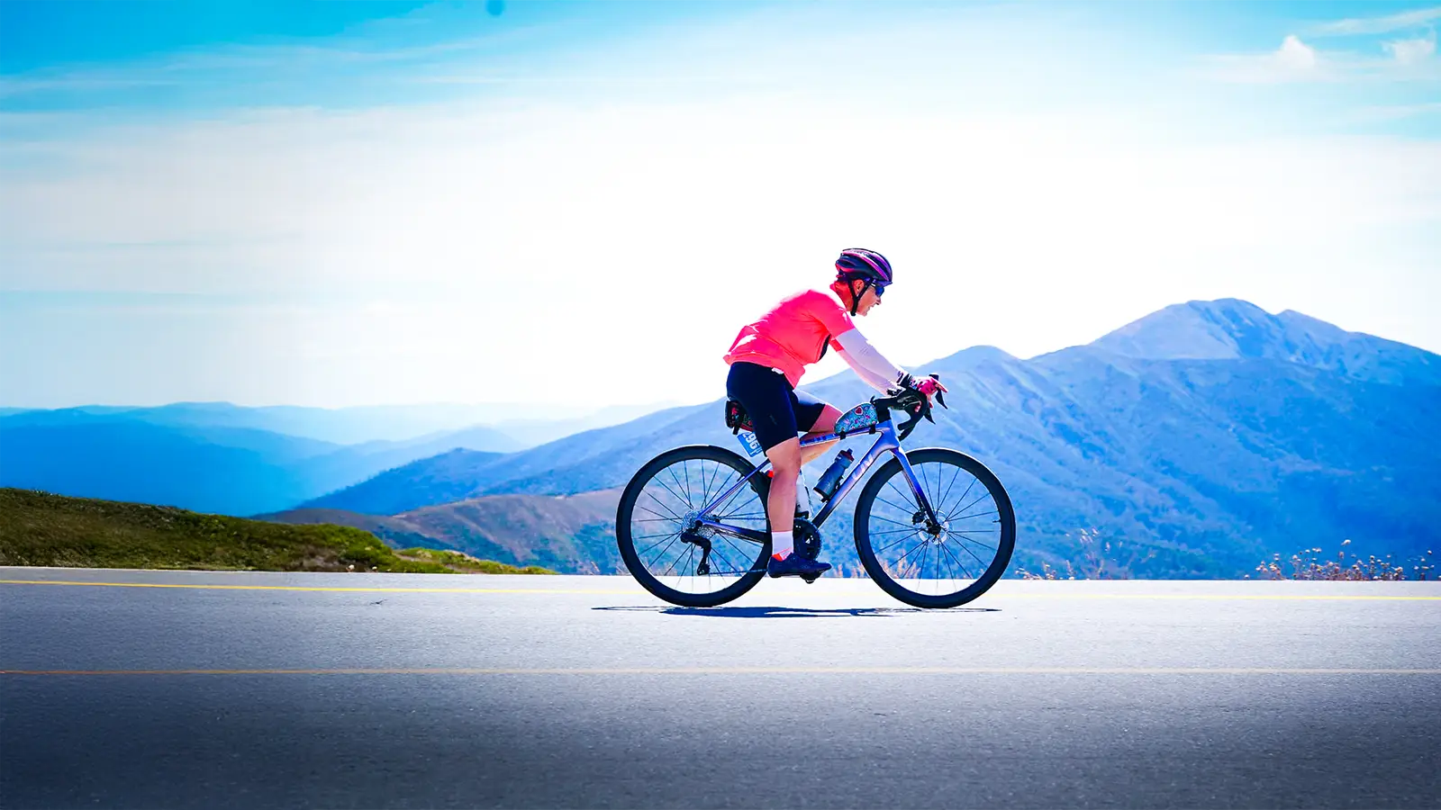 A cyclist riding on a road