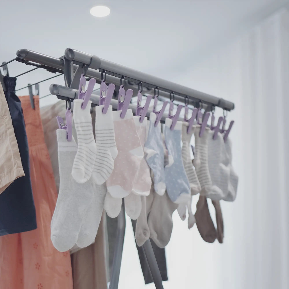 Grey Deluxe SmallsMate loaded with laundry